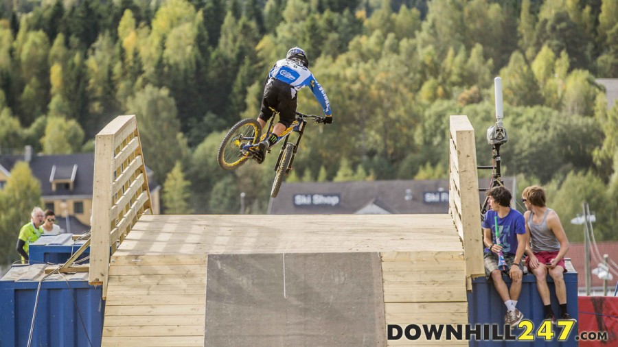 Sam Hill clearly impressing a few spectators on what is really the only new section on the course - a jump over the cross country track!