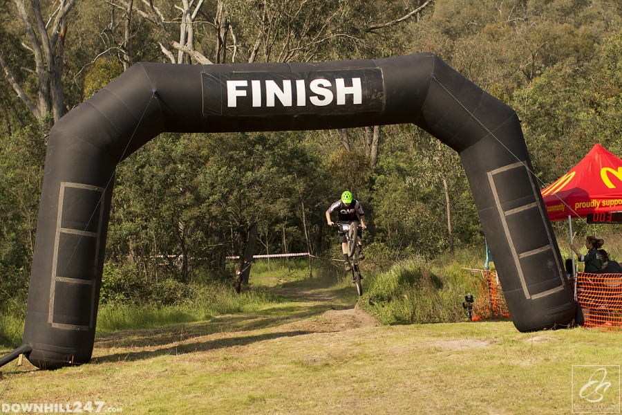 You can never take the downhiller out, Dean Lucas powers over the line.