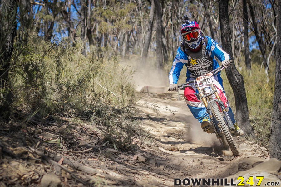 Teejay Clark took the Expert Men's title for 2013 with a blistering run. Here, midway down the track TJ has his eyes on the prize.