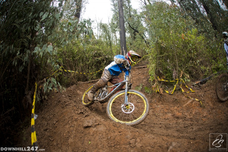 Louis Armitage pushes hard into the berm with full confidence in the traction of his tires.