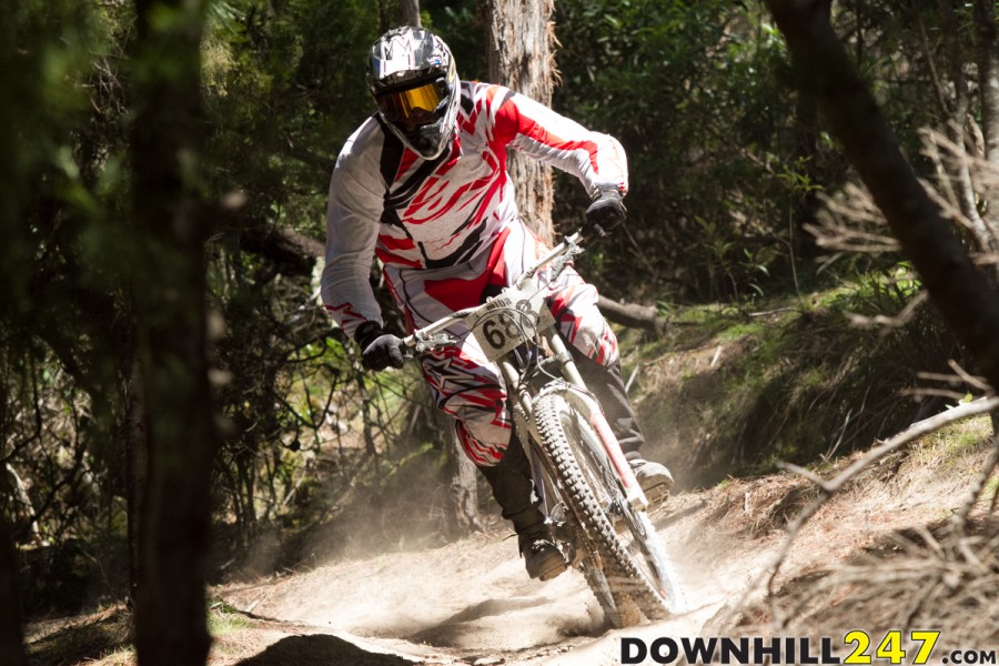 Tim Sumpton kicking up dust amongst the Tassie bush