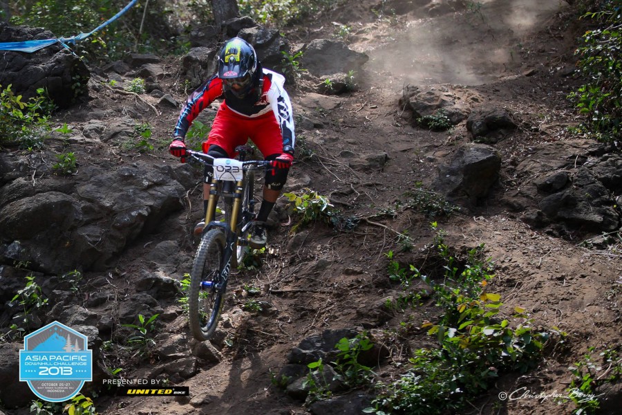 Yuki Kushima charging one of the rock sections on the track.