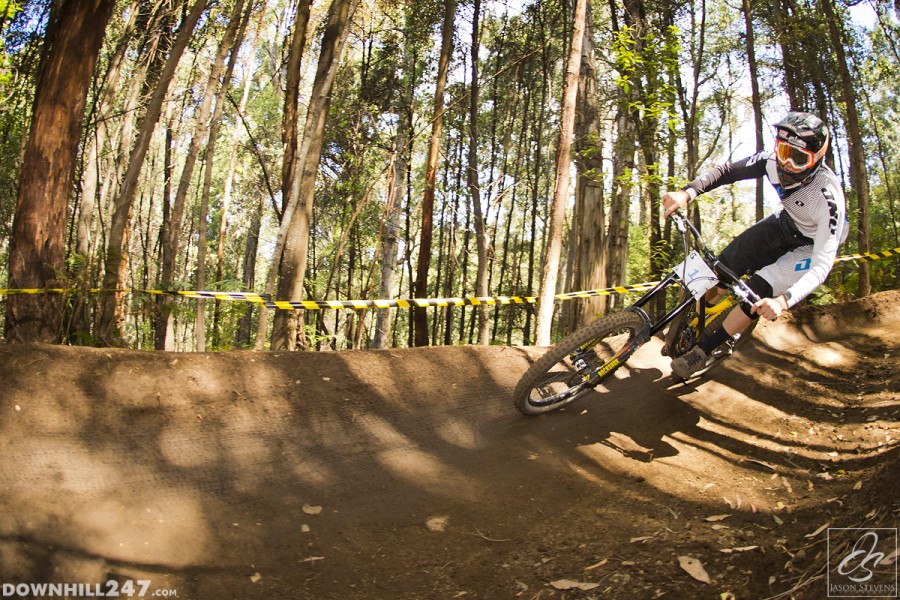 Dean Lucas pushes hard through one of the longest berms on track.