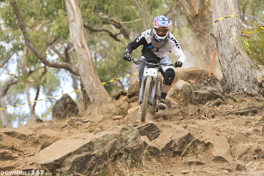 Max Kreuzer stomps the landing after gapping the mid section of the rock garden.