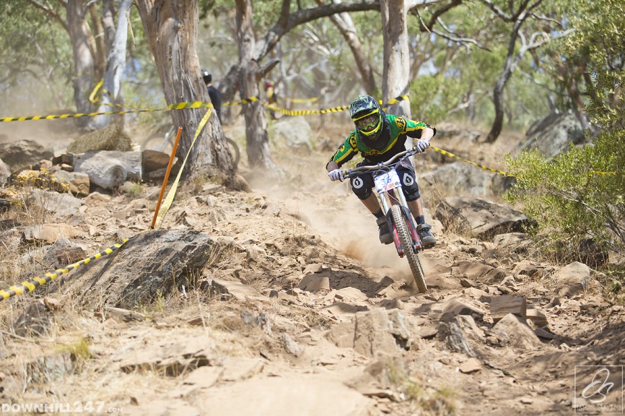 Kyle Coutts pushes hard out of the rocks and into the berms.