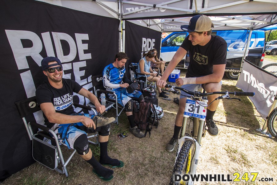 Good times in the pits, everyone having a laugh before the serious end of proceedings.