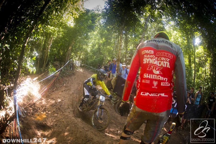 Greg Minnaar watches on as a competitor negotiates the course.