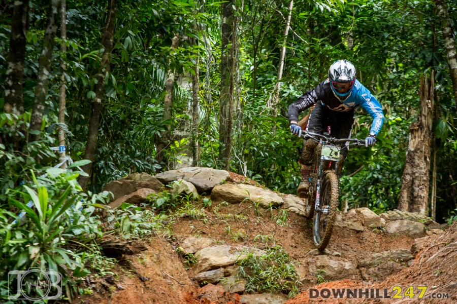 Loris Vergier drops in to the final off-camber chute, on his way to the finish of a flying race run.