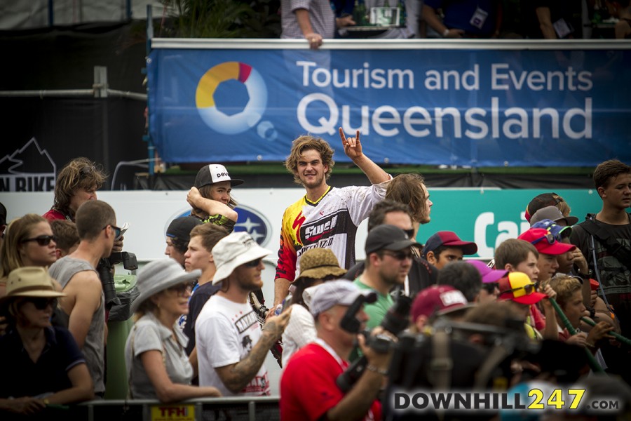 David 'Mayhem' McMillan throwing horns.