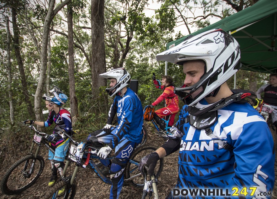 A couple of Aussies watch on, Tracey Hannah, Will Rischbieth and Josh Button.