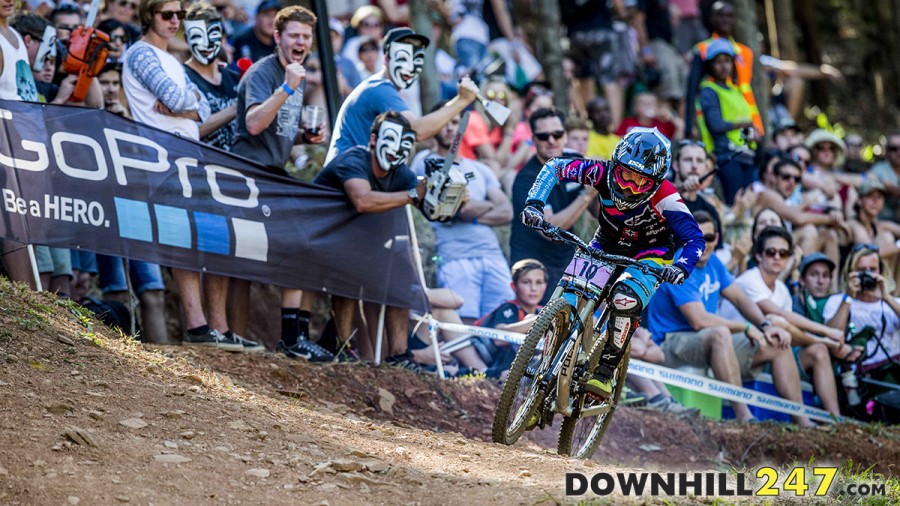 Check out those crazy fans in the background! The noise of chainsaws filled the last gully! Tracey Hannah pushing hard to the finish line, 6th place was her reward.