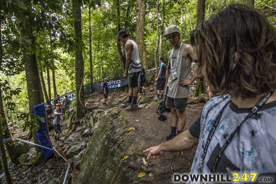 Connor Fearon points out some lines while Ty from Captyvate Media looks on. Dean Lucas looks up from the bottom.