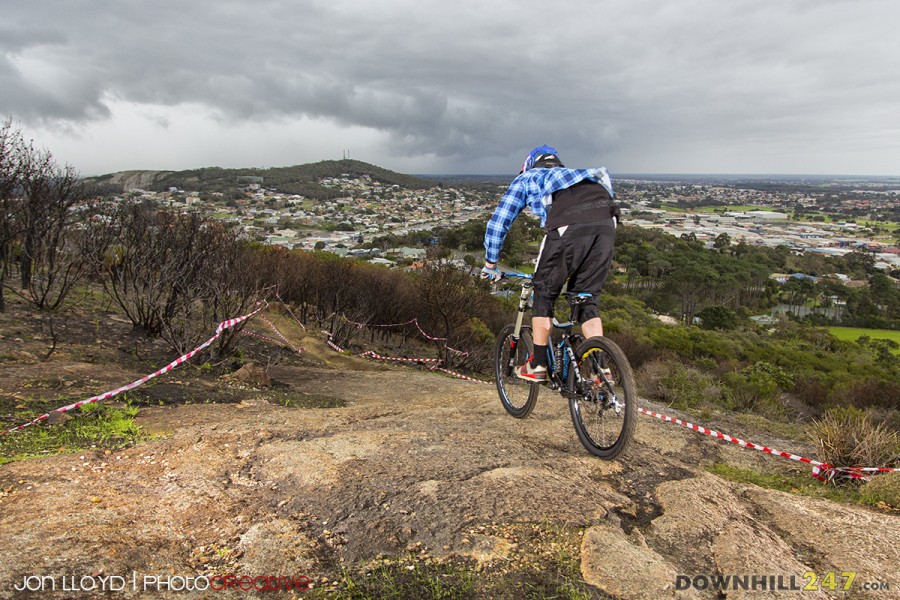 Dane Van Ryt heads down the track, the weather was testing everyone but you can't let this put you down, we are mountain bikers after all!