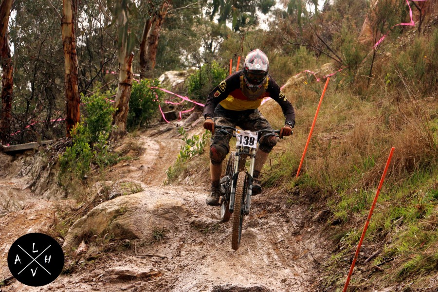 Out from behind the camera for a change, Campbell "CamJam" James tries the off camber before the top rock garden.