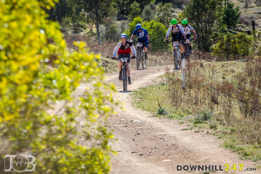 During practice the social side of the event came to light. Here riders of all categories reach a plateau in the only timed fire trail section.