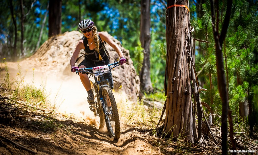 These girls are no slouches on bikes either! Shelly Flood borrowing the photographers bike for a bit of fun.