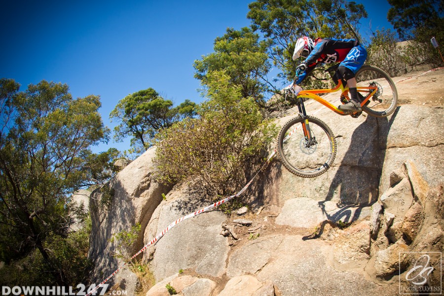 Tim Eaton drops in on a line that some would cringe at even on a DH bike, making it look easy and smooth.