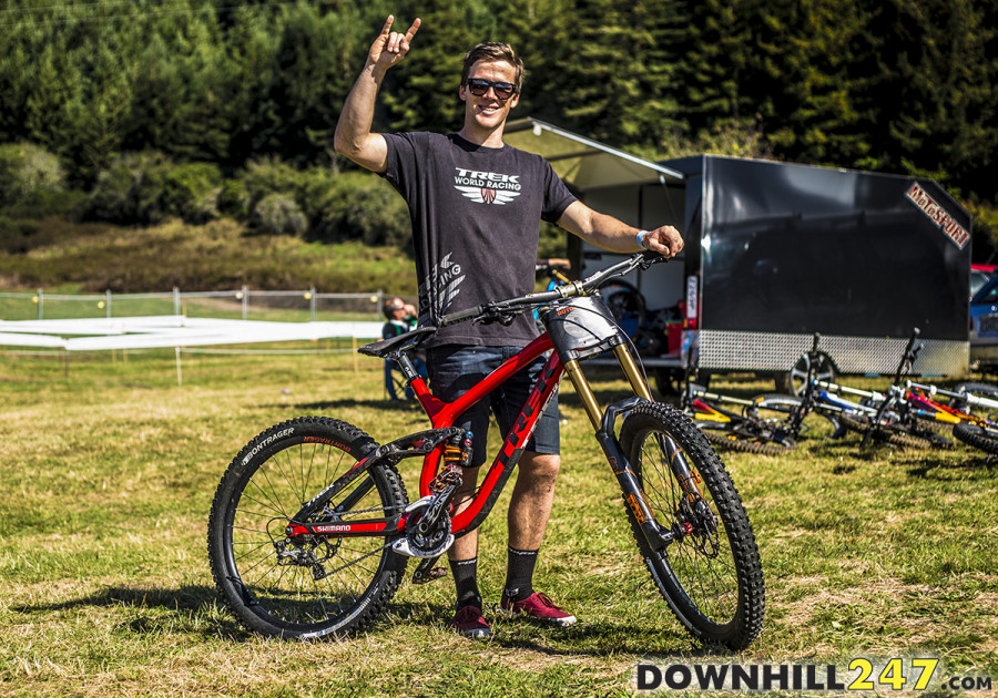 George Brannigan throws horns while he show's his Trek. These bikes have been evolved over plenty of seasons now and are a reliable platform for sure.