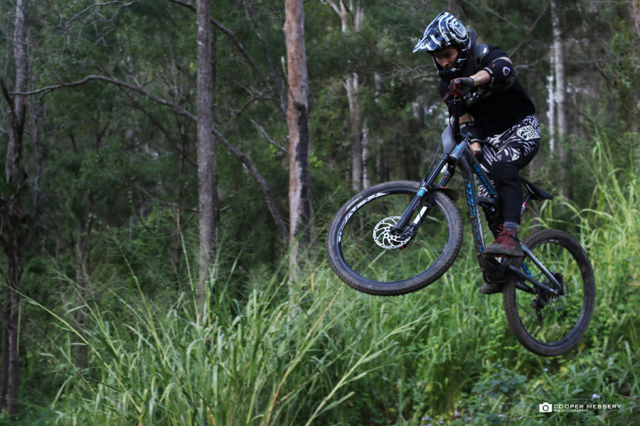 The racers were throwing down a bit of style at the step down double early on in the track.