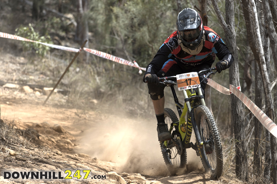 Daniel Neumann drifting towards the trees.